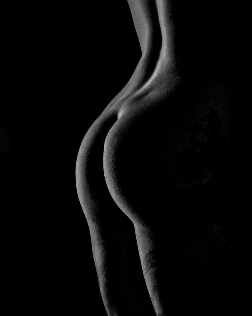 Bodyscape opname in laag licht